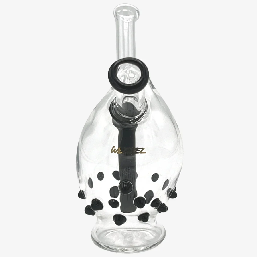 Beastie Bubbler Gold von WEEZEL in Ei-Bauform aus klarem Glas mit schwarzen Noppen und goldenem Logo