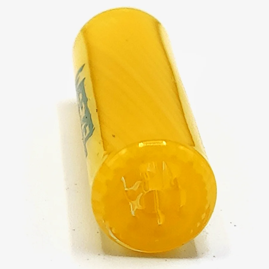 Der gelbe WEEZEL Flow Tip Spiralfilter mit grünem Logo, von vorne