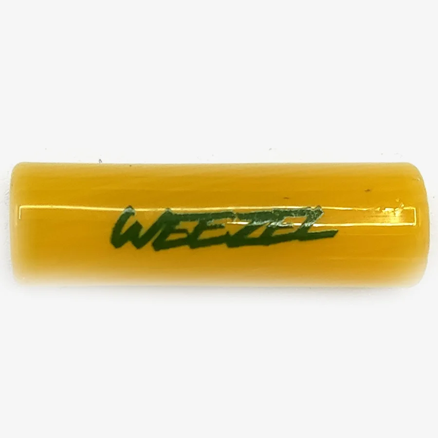 Der gelbe WEEZEL Flow Tip Spiralfilter mit grünem Logo, seitlich
