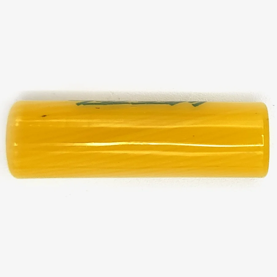 Der gelbe WEEZEL Flow Tip Spiralfilter mit grünem Logo, von oben