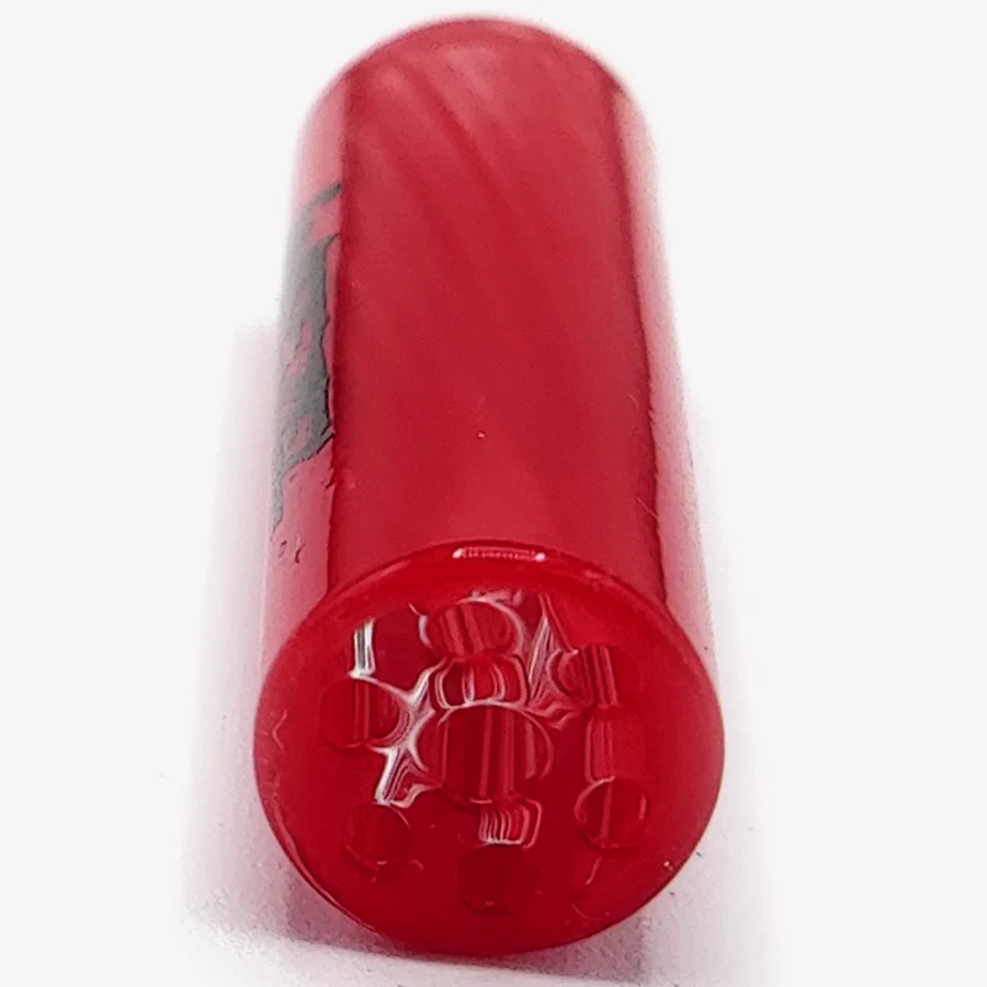 Der rote WEEZEL Flow Tip Spiralfilter mit grünem Logo, von vorne